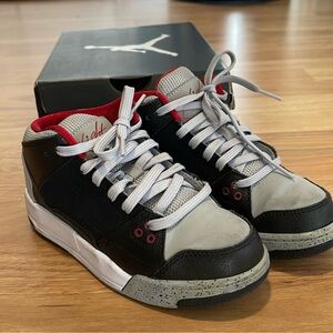 Kids Nike Jordan Black and Gray Sneakers Mid-Top Design